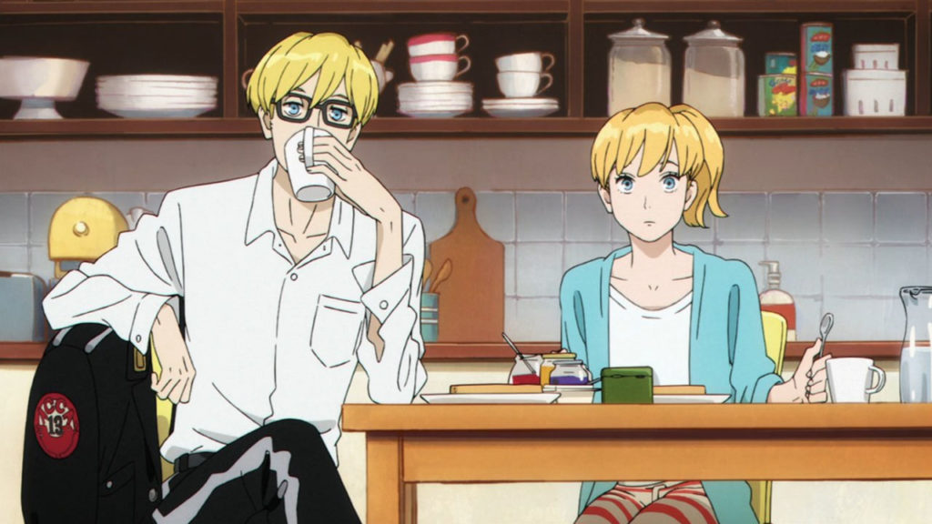 Jean Otus e Lotta, personagens do anime ACCA 13-ku Kansatsu-ka sentados em uma mesa na cozinha tomando chá.