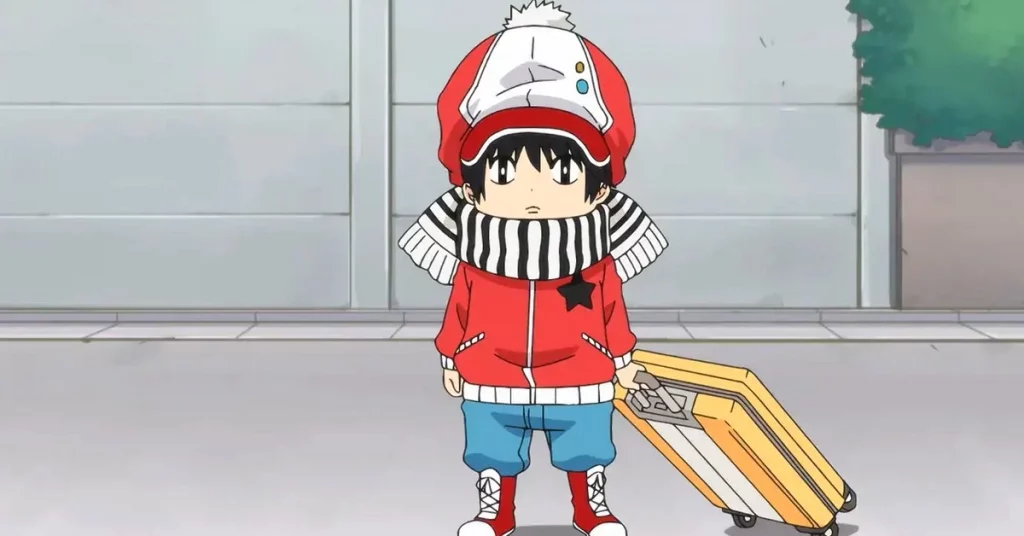 Kotaro, Protagonista do anime Kotaro vai morar sozinho, em pé segurando uma mala e vestindo roupas de frio.